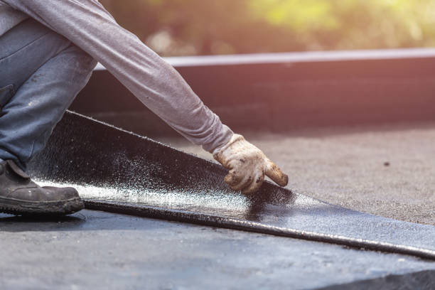Professional Waterproofing technician working in Patchogue, NY